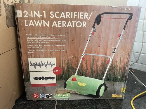 Scarifier and lawn - in,