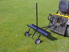 SCARIFIER -  DE- THATCHER